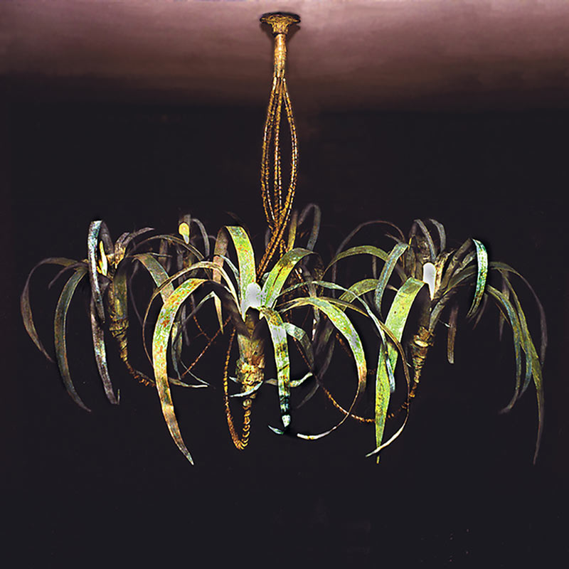 Designed and Created by Heather for a private client, this palm chandelier spirals from the ceiling is made with anodized copper and brass leaves Designed and Created by Heather for a private client, this palm chandelier spirals from the ceiling is made with anodized copper and brass leaves